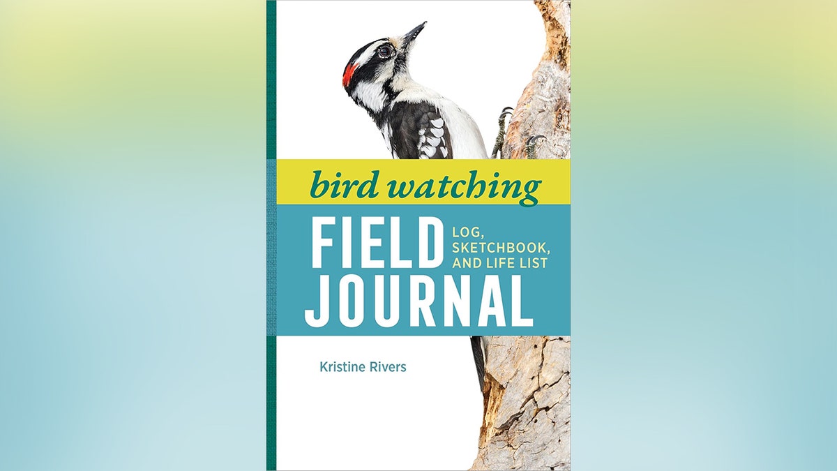 A bird watching field journal book with a bird on the cover.