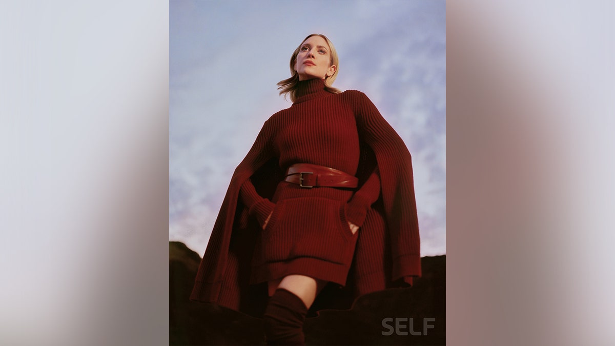 Brittany Snow in a red long-sleeve outfit for Self Magazine