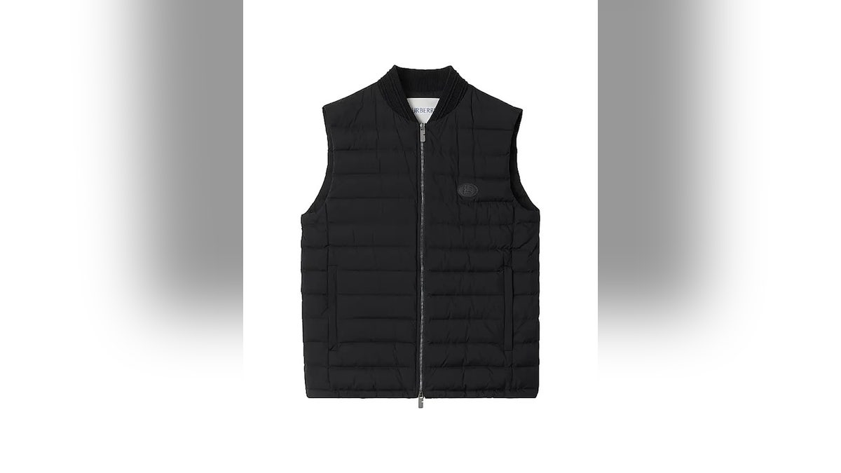 Layer up in luxury with this vest.   