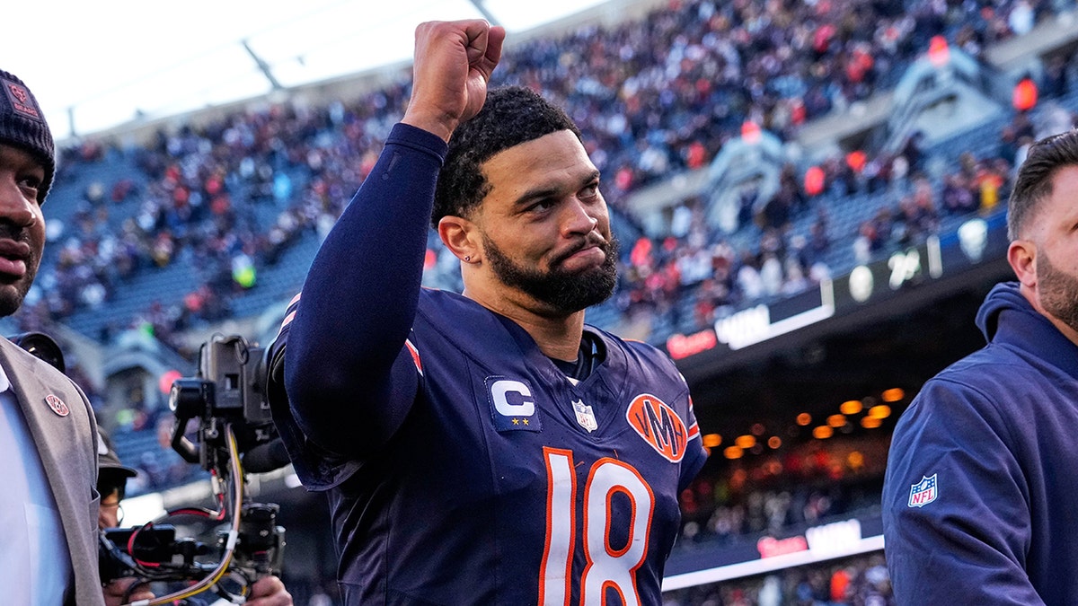 Caleb Williams walks off field