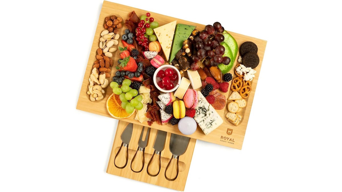 Feed hungry guests fast by putting out appetizers on a charcuterie board. 