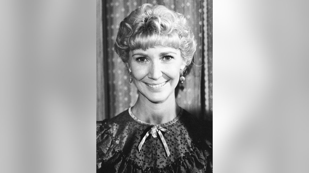 A close-up of Charlotte Stewart in character as Miss Beadle.