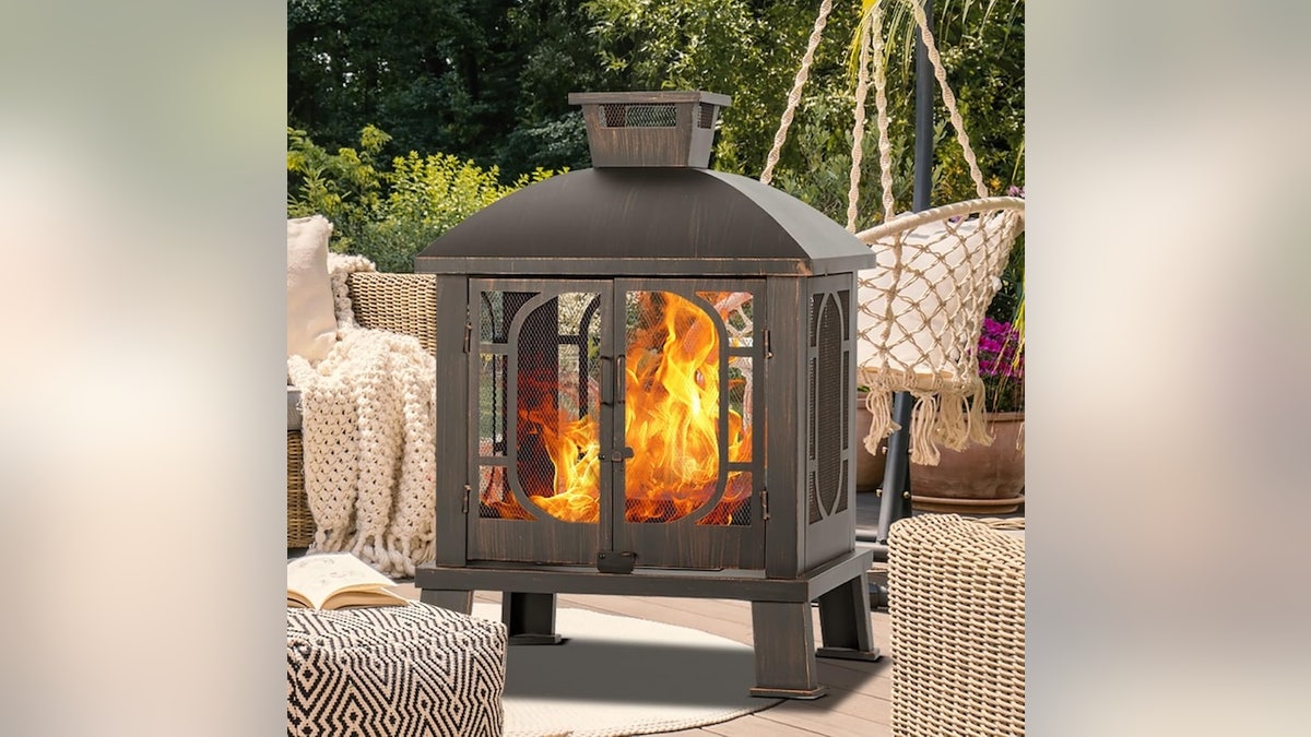 This metal chiminea fire pit combines the best of a grill and a fire feature.