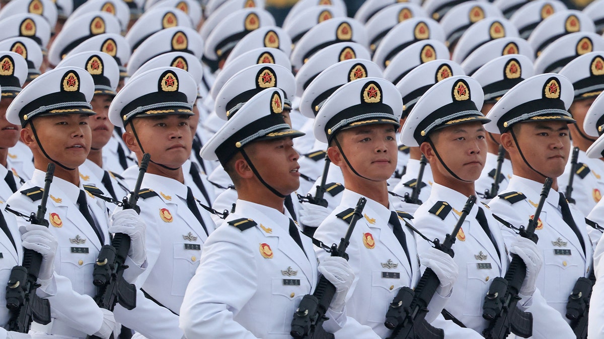 Chinese military troops march 