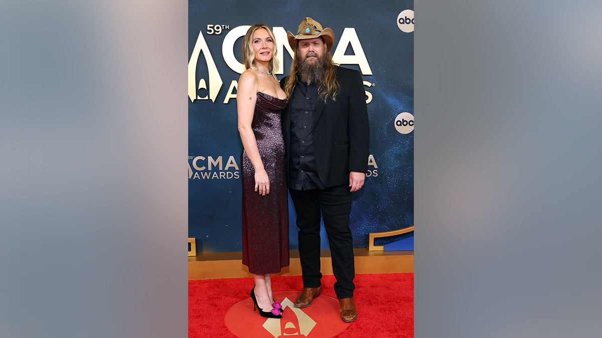 Chris Stapleton and Morgane Stapleton on the red carpet at the 2025 CMA red carpet