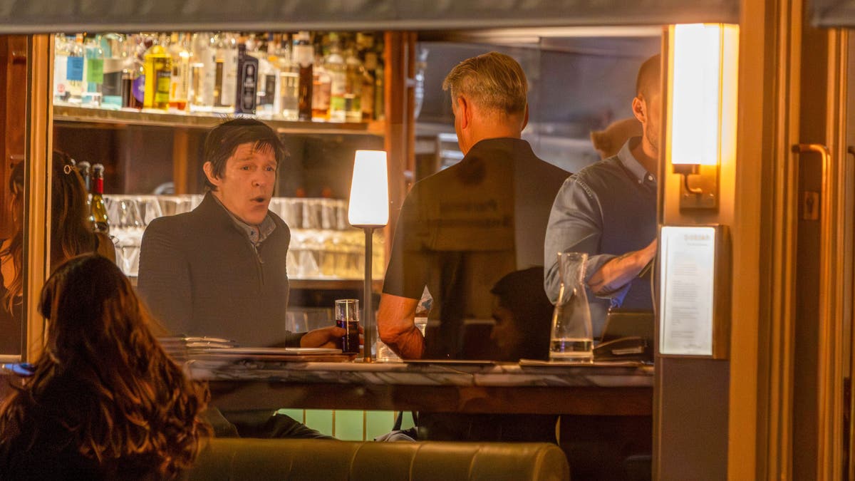 Christopher Brosnan sits at the bar inside Dorian restaurant in London during a family dinner.