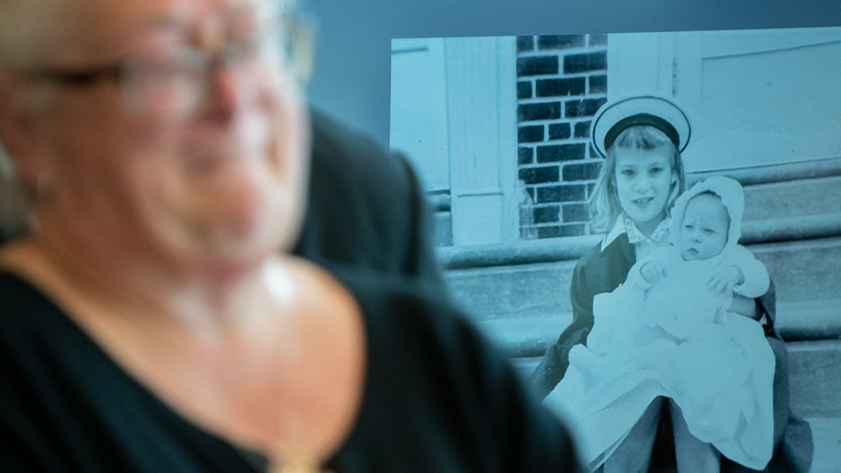 An undated family photo shows Carol Ann Dougherty holding her sister, Kay.