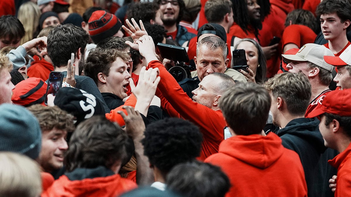 Pat Kelsey with fans after a win