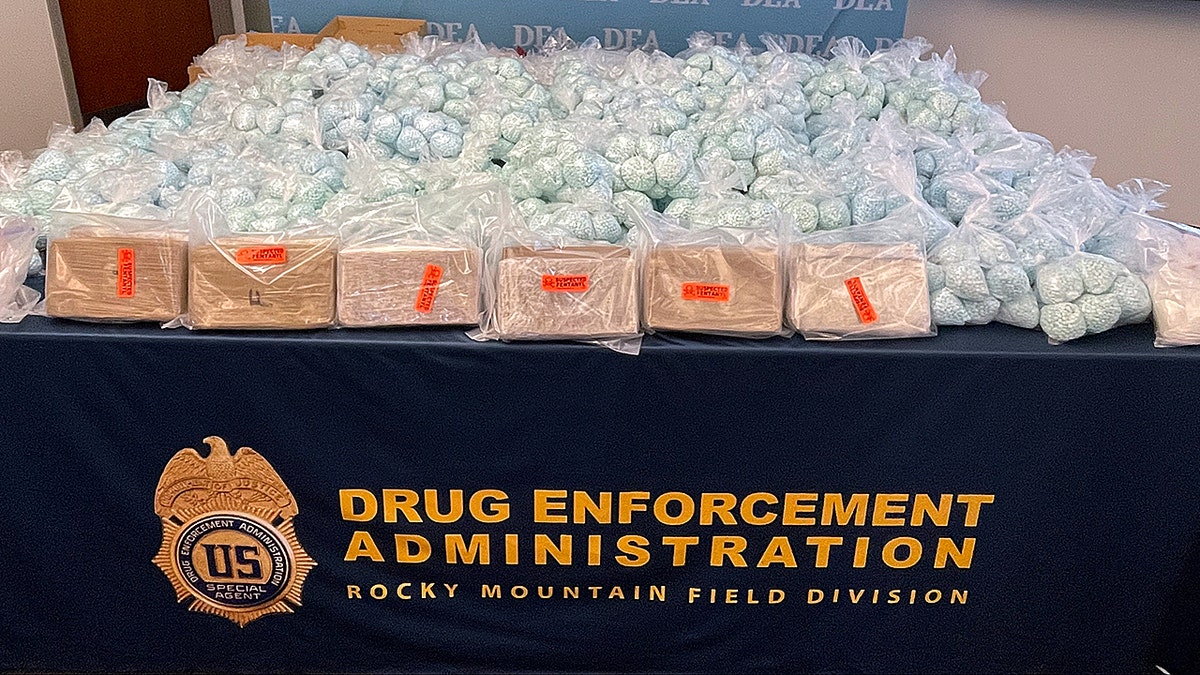 Drugs on table that were found in storage unit in Colorado