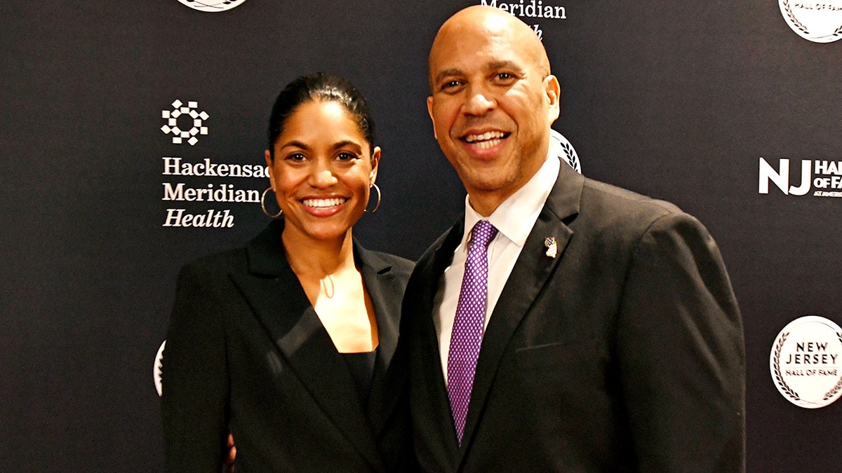 Cory Booker and Alexis Lewis smiling
