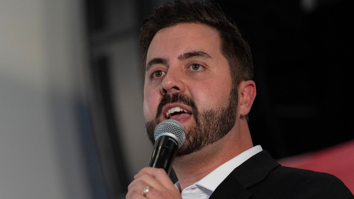 Cincinnati pastor Cory Bowman speaks during a town hall