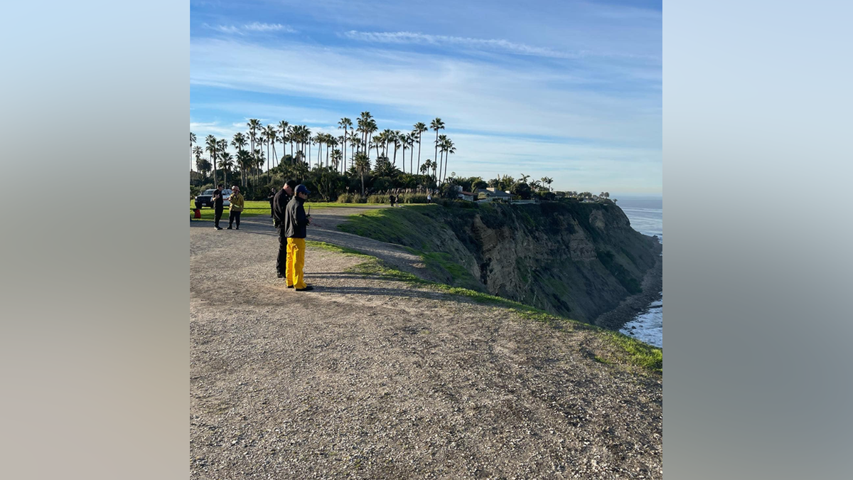 Palos Verdes emergency response standing near cliff