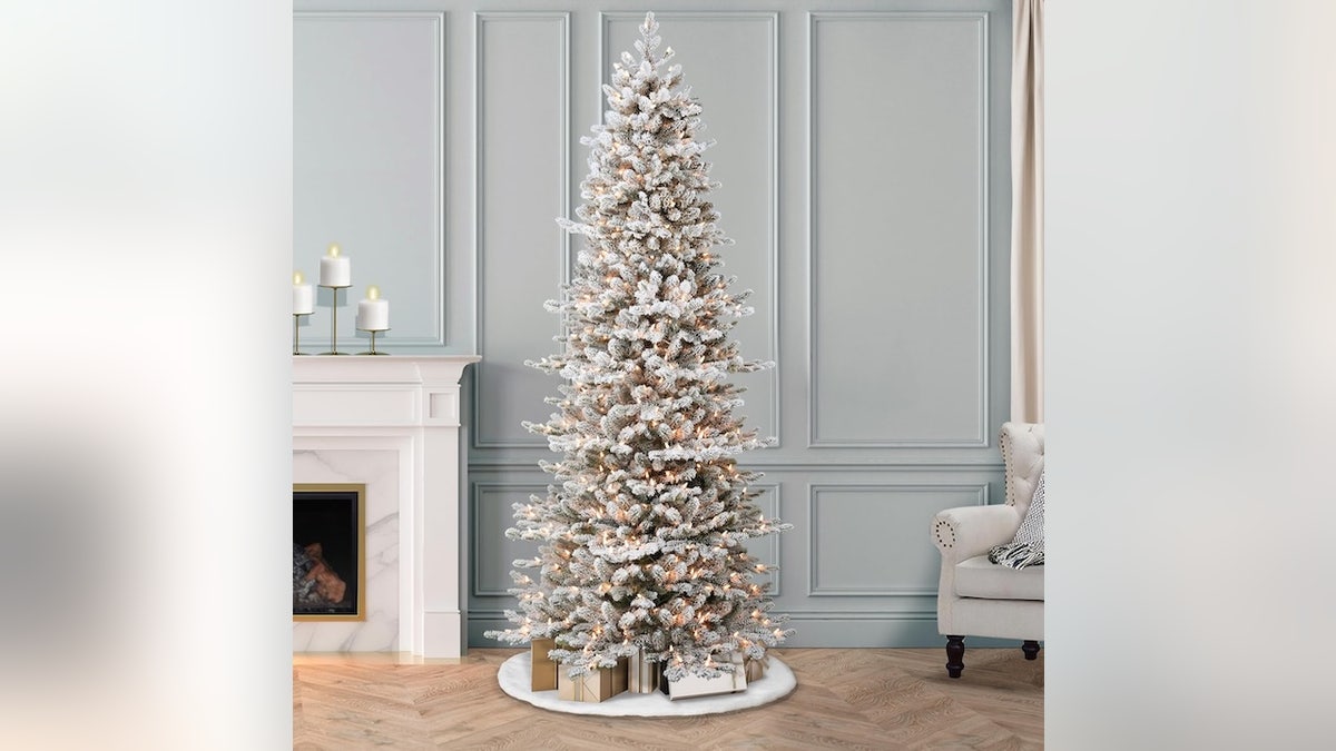 If you love the look of fresh snow but prefer staying cozy indoors, this is your tree.