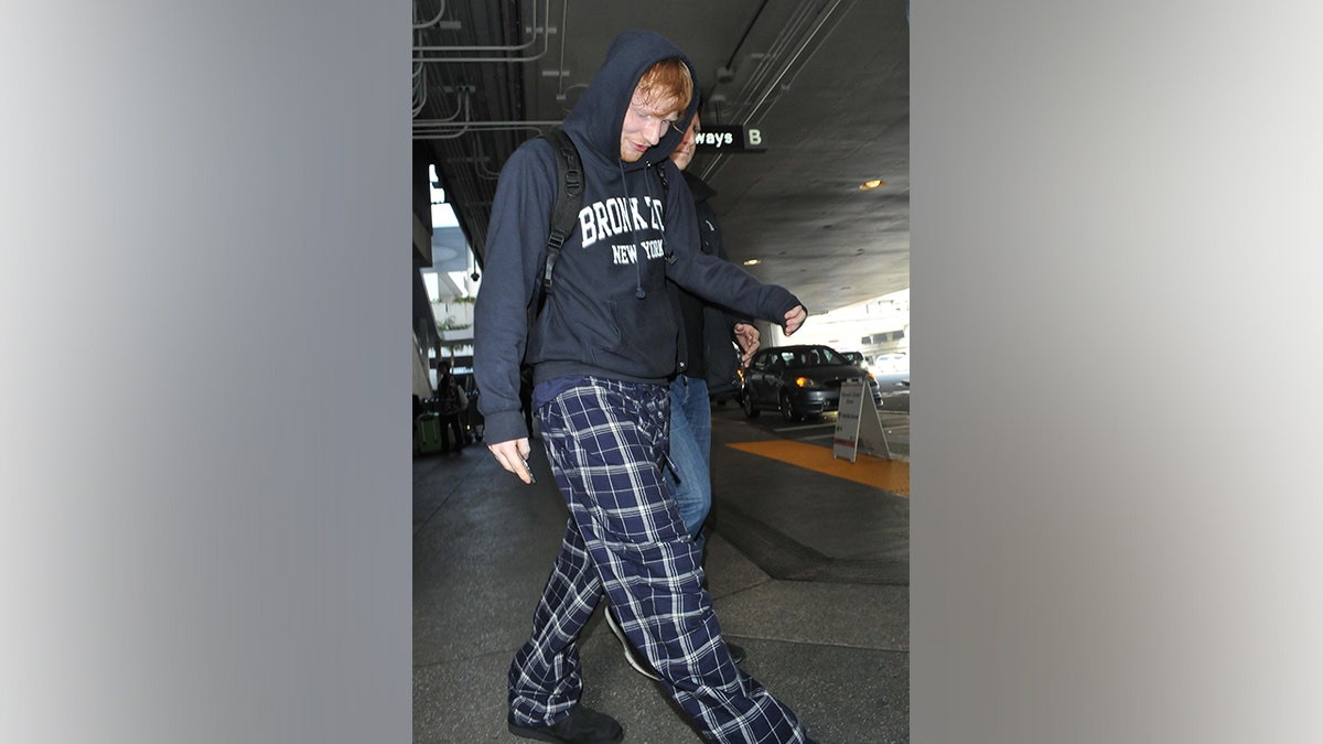 Ed Sheeran travels in pjs at the airport