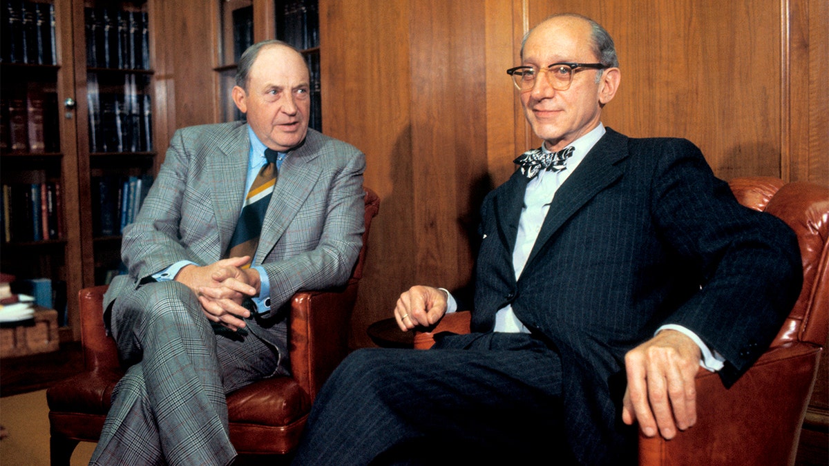 Attorney General-Demign Edward Levi meets with outgoing Attorney General William Saxbe at the Department of Justice.