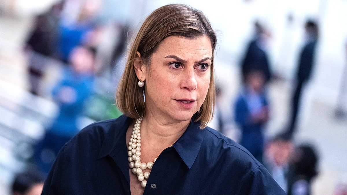 Sen. Elissa Slotkin walks through the U.S. Capitol during a voting session.