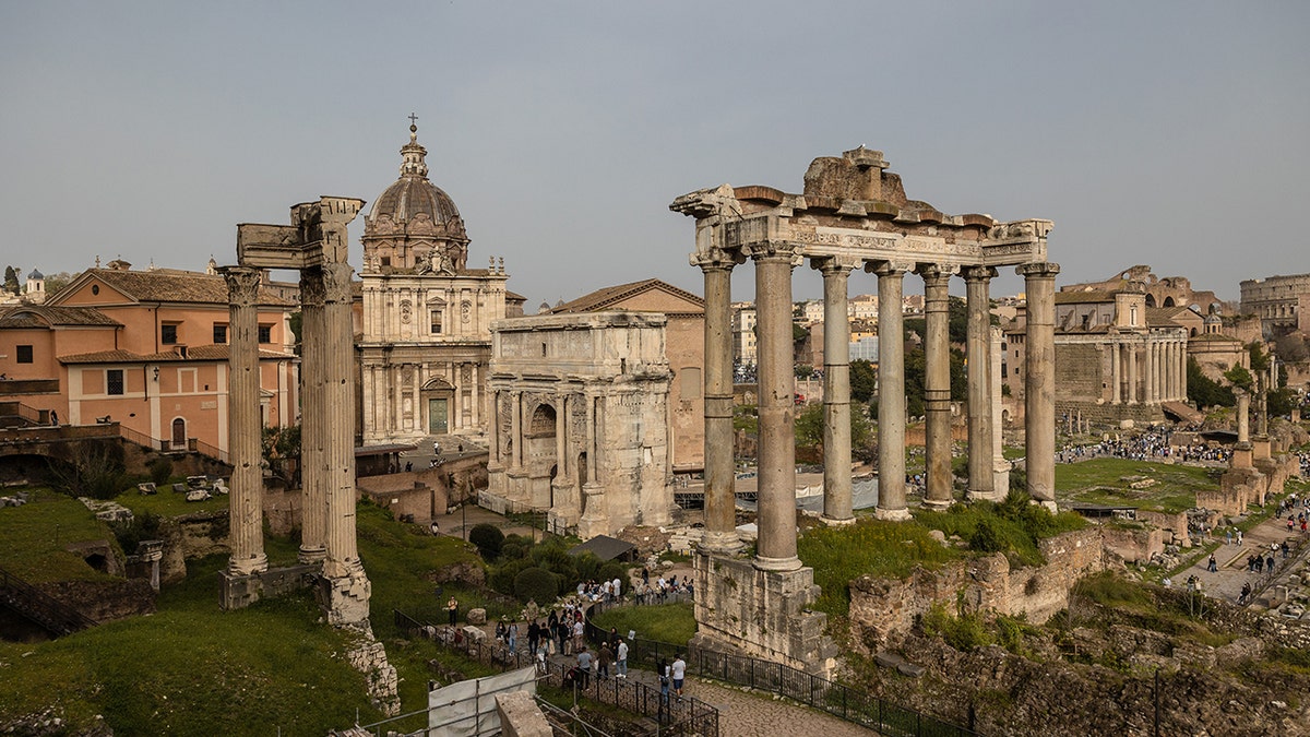 View of ruined temple near the Colosseum in Rome.