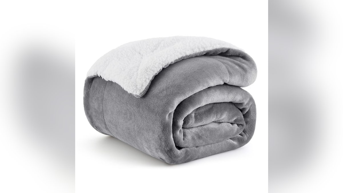 You’ll stay warm with this reversible blanket.