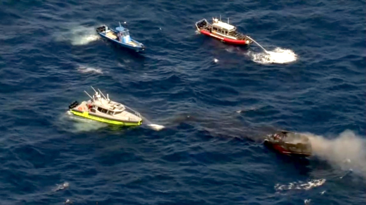 Florida boater rescues two people from vessel engulfed in flames off coast at george magazine