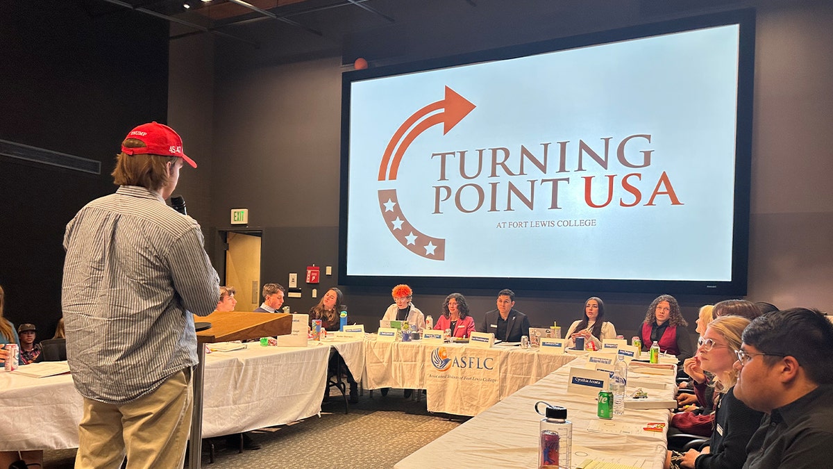 Jonah Flynn delivering presentation at Fort Lewis College