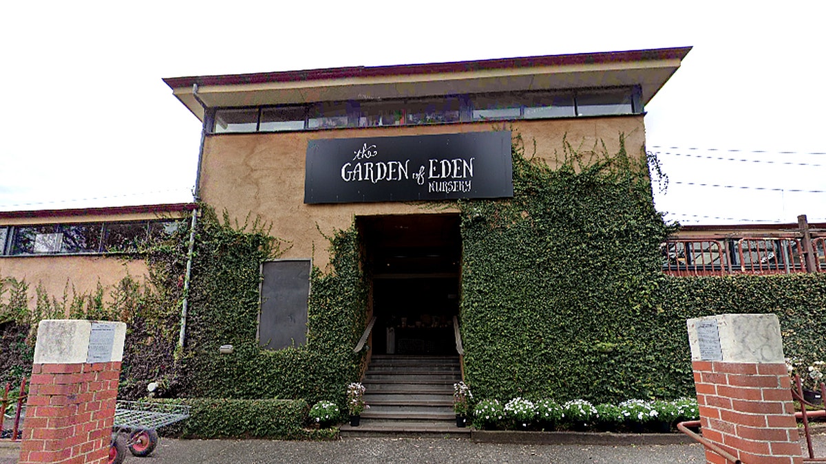 front entrance of nursery building with green vines across walls