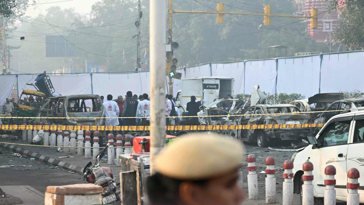 Forensic experts investigate car bombing in India.