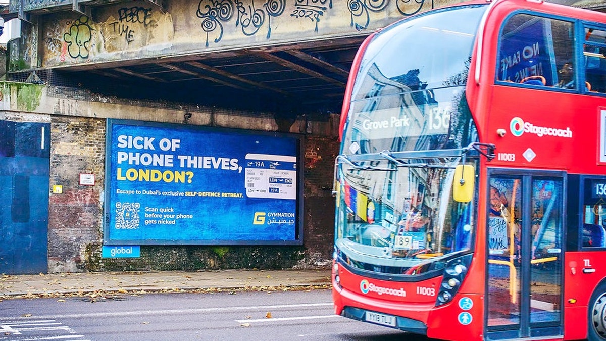 gymn nation ad in london promoting escape to dubai to defend against phone theft