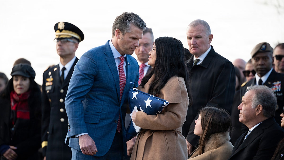 War Secretary Pete Hegseth offers condolences to widow Sarah Verardo at Arlington