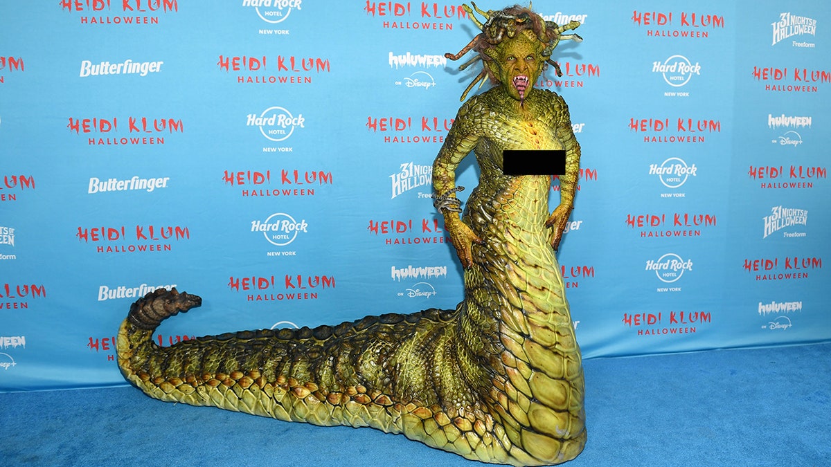 Heidi Klum attends her 24th Annual Halloween Party dressed in a scaly Medusa costume.
