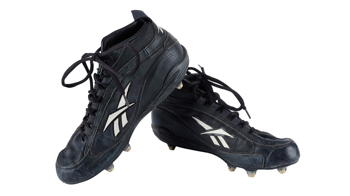 Jonathan "Mox" Moxon’s football cleats worn by James Van Der Beek in Varsity Blues (1999).