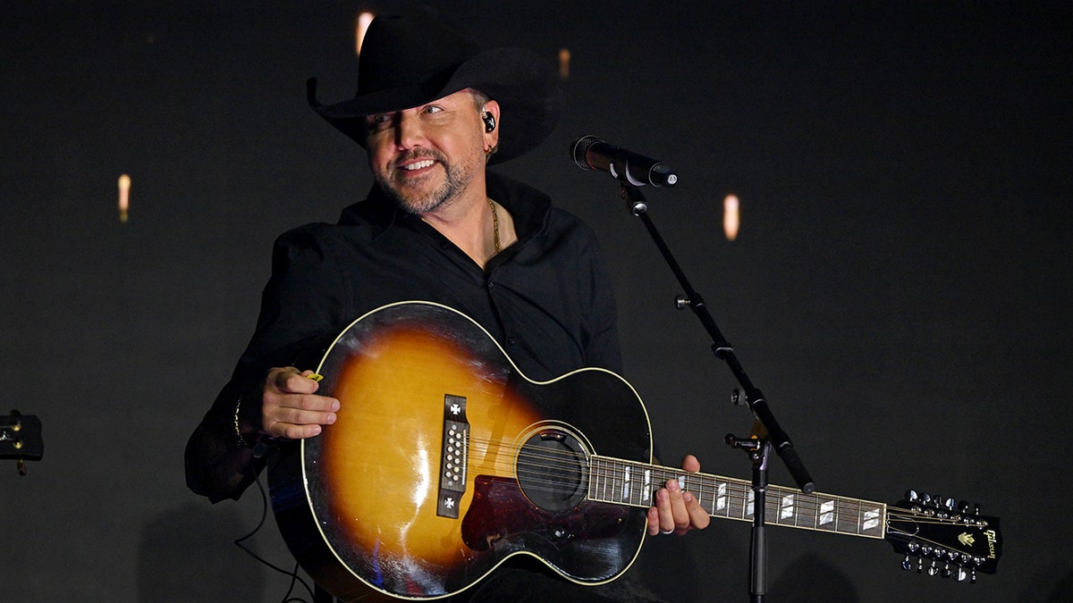 Jason Aldean performing on stage at the Patriot Awards in November 2025.