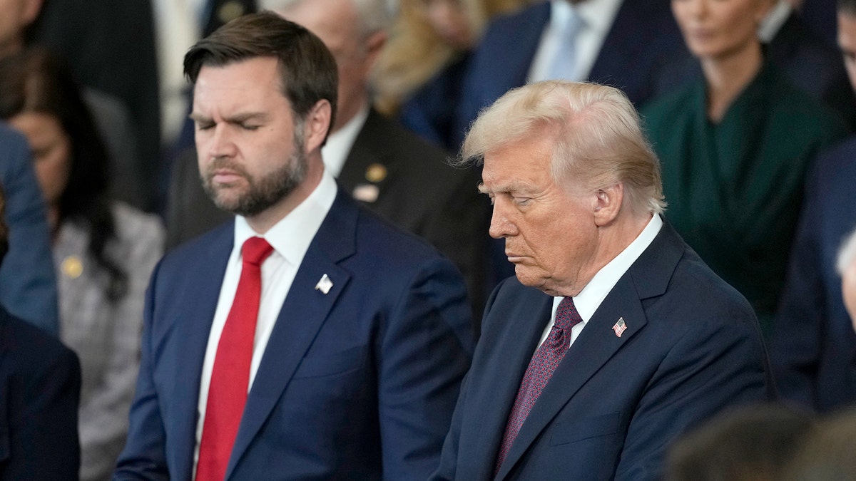Vice President JD Vance and President Donald Trump pray