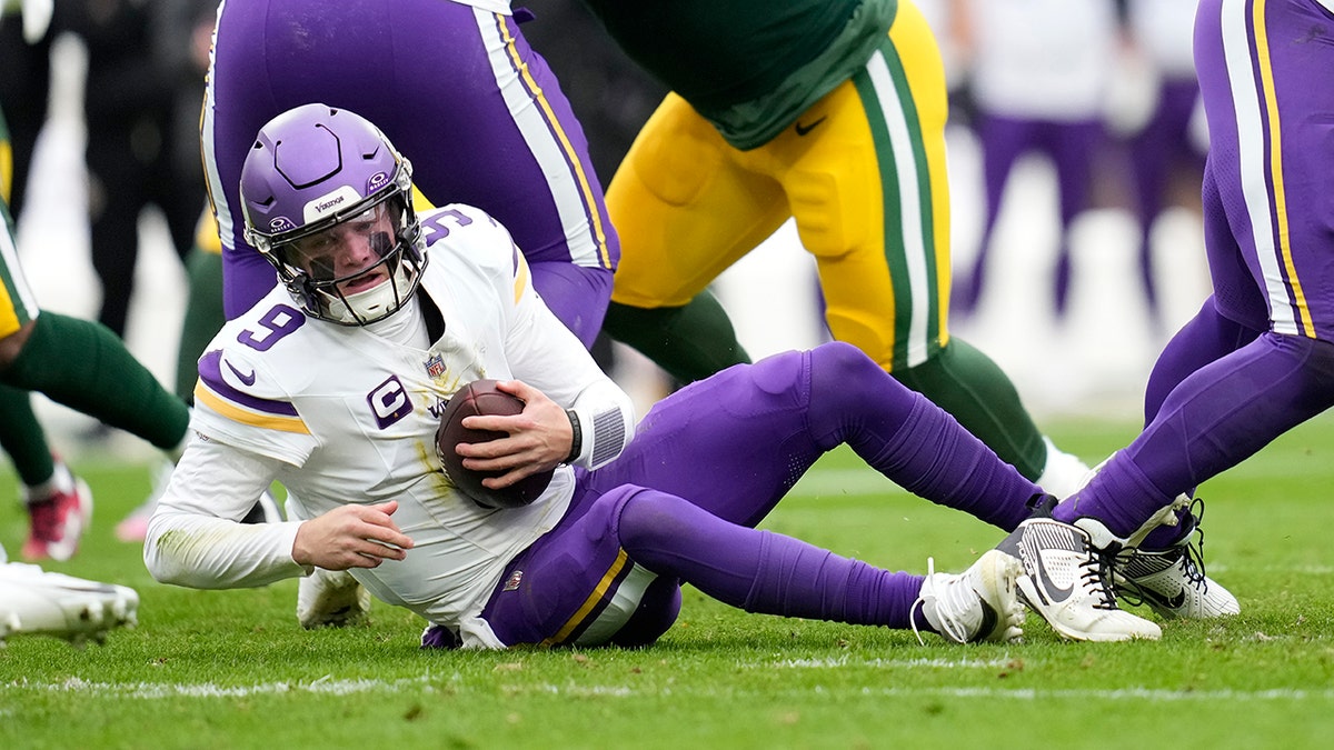 J.J. McCarthy sacked