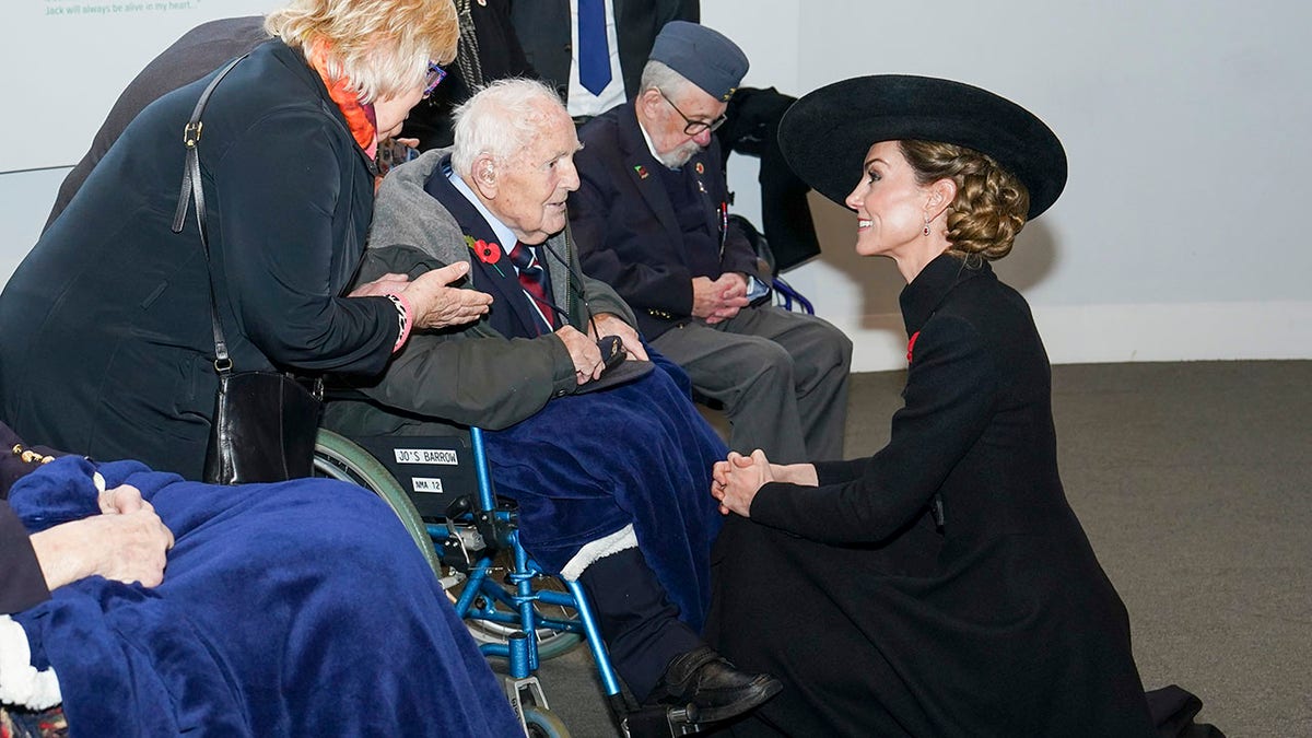 Kate Middleton talking with WWII veteran Geoffrey Spencer