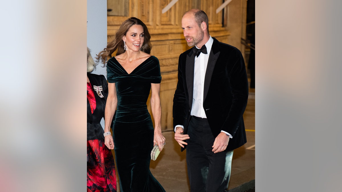 Kate Middleton and Prince William walking together side by side at Royal Albert Hall.
