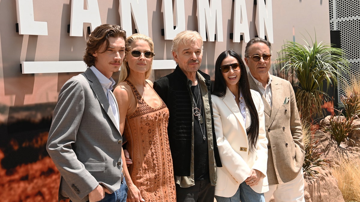 The cast of Landman poses for a picture together