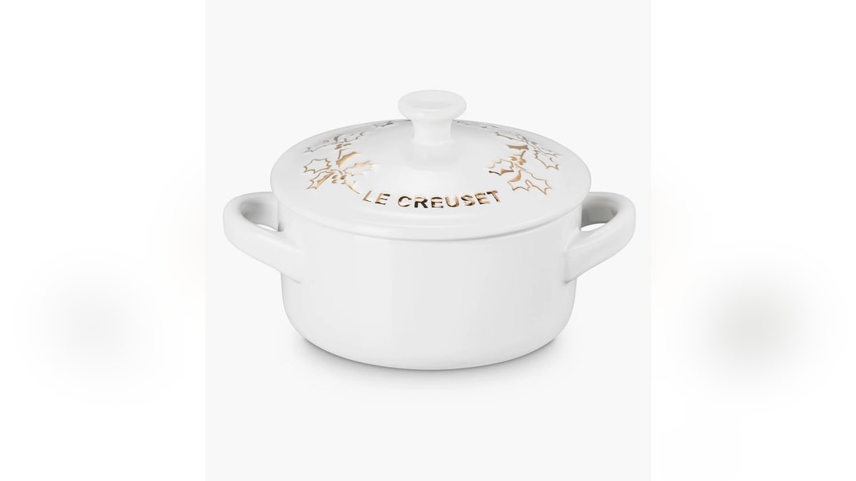 Add a touch of holiday whimsy to any kitchen table with this mini cocotte.