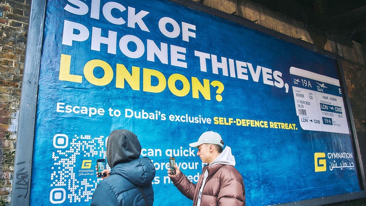 gymn nation ad in london promoting escape to dubai to defend against phone theft