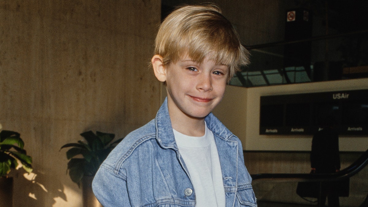 Macaulay Culkin in 1990 at an event.