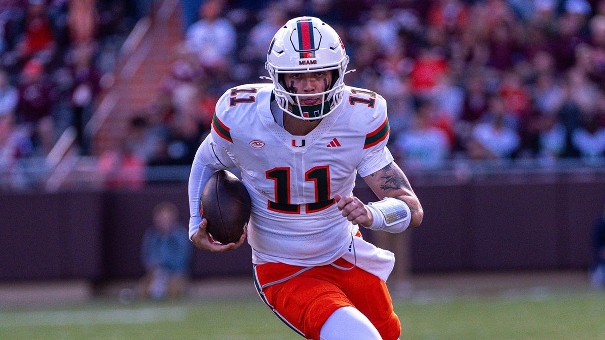 Carson Beck runs the ball