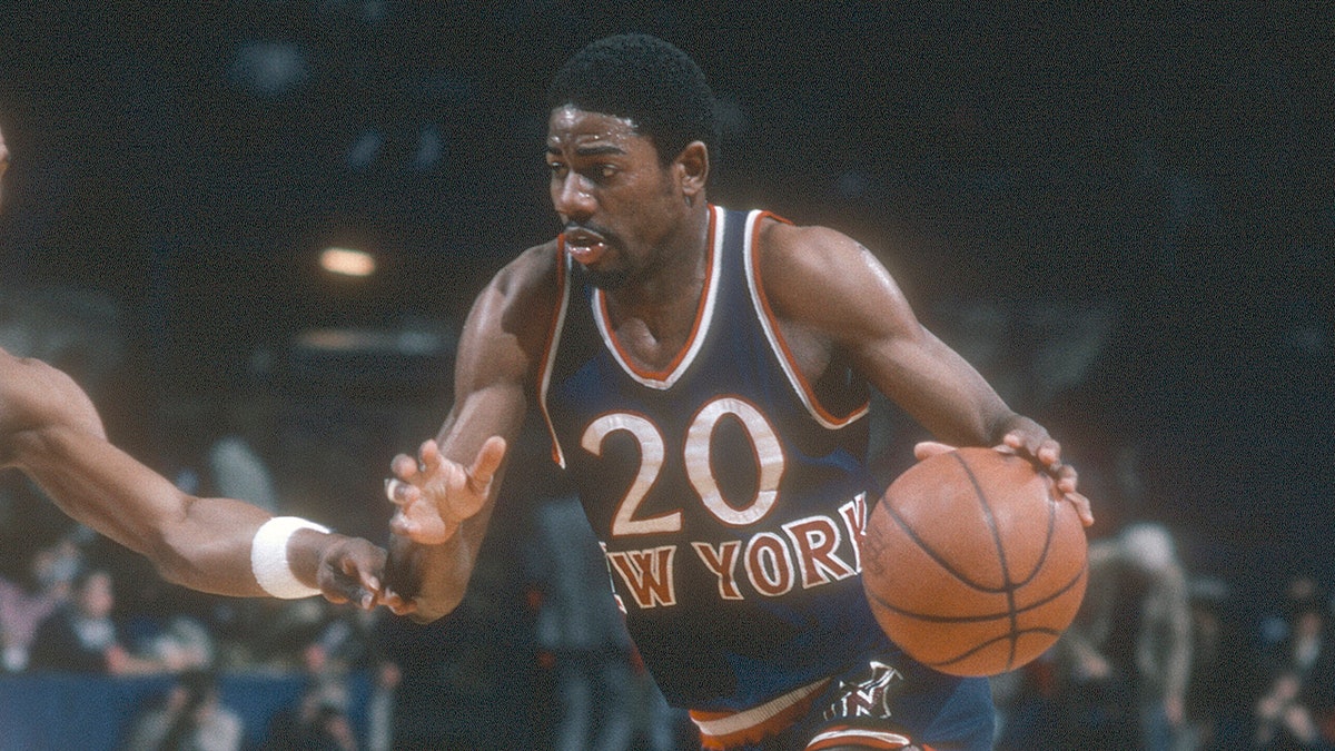 Michael Ray Richardson on court