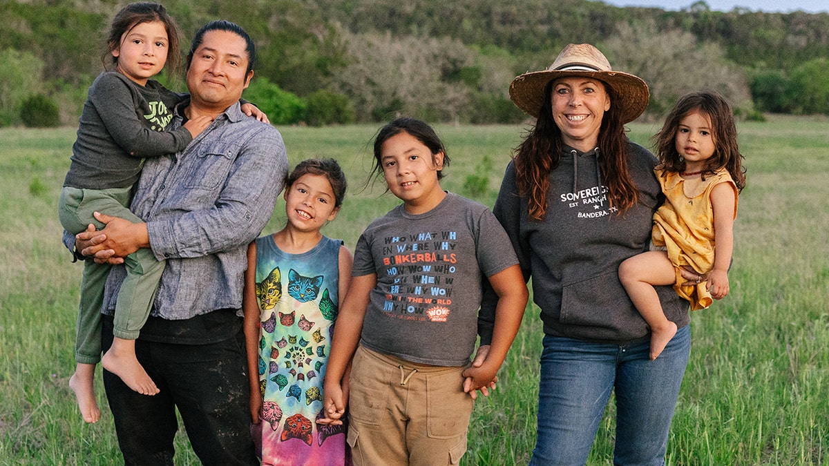 Mollie Engelhart is pictured with her husband and four children.