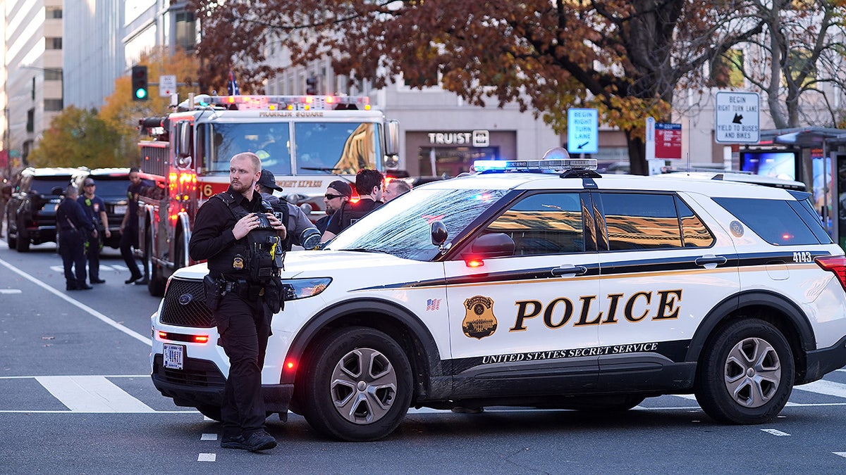 Streets are blocked after two National Guard soldiers were shot near the White House in Washington, Wednesday, Nov. 26, 2025. (AP Photo/Evan Vucci)