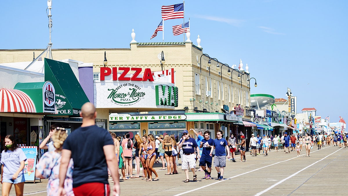 Ocean City, NJ, visitors walk on the boardwalk