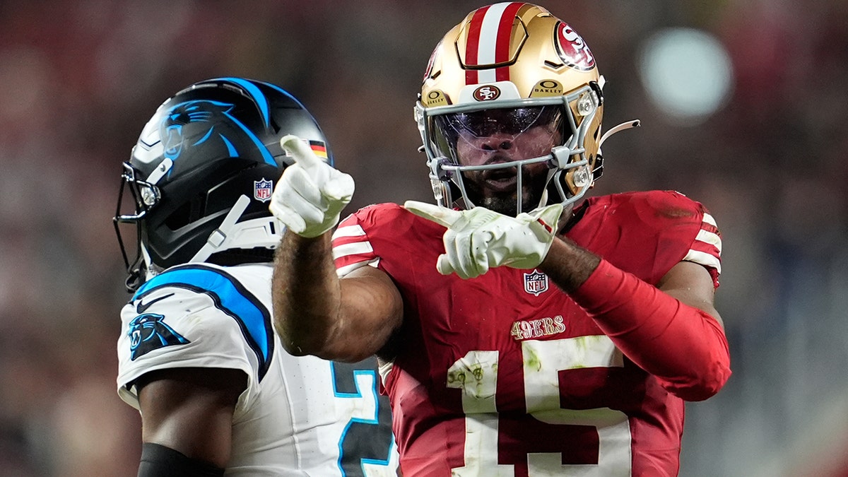 Jauan Jennings points down field