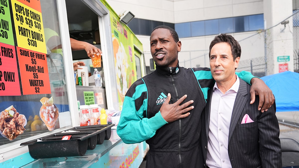 Antonio Brown and Mark Eiglarsh outside of jail