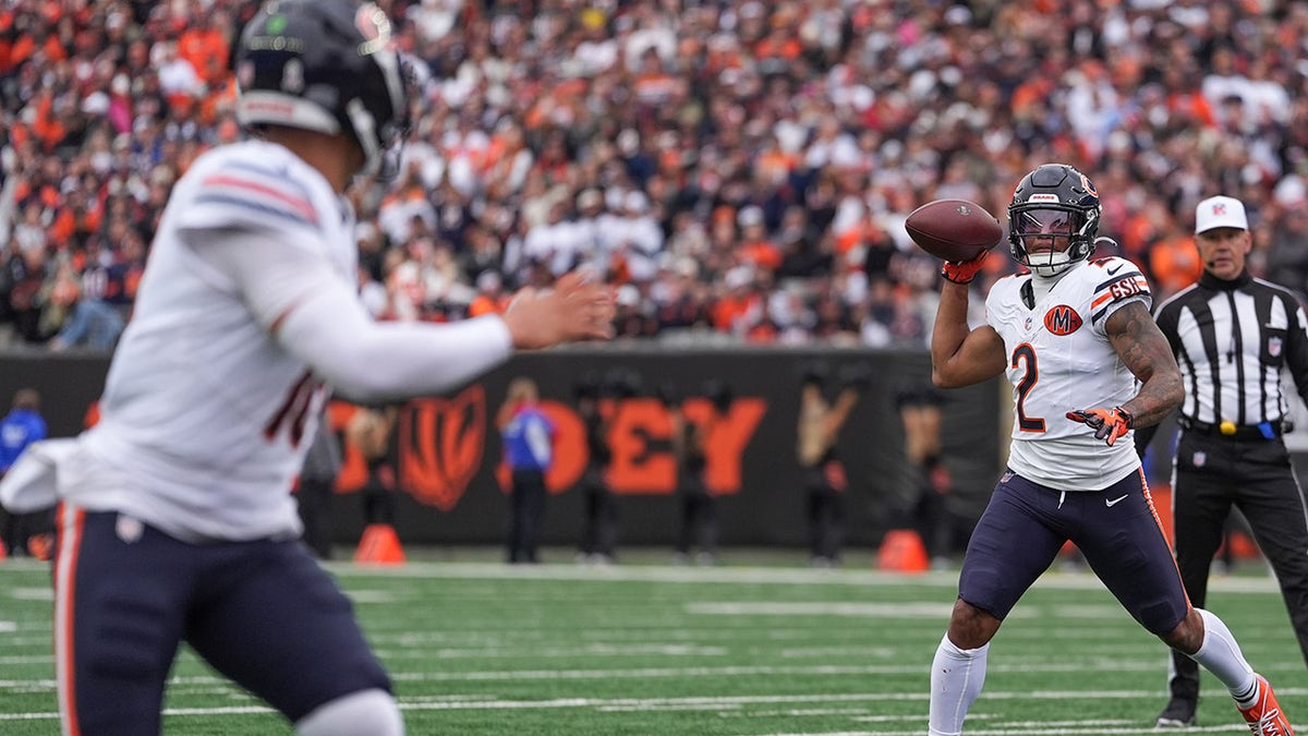 DJ Moore throws to Caleb Williams