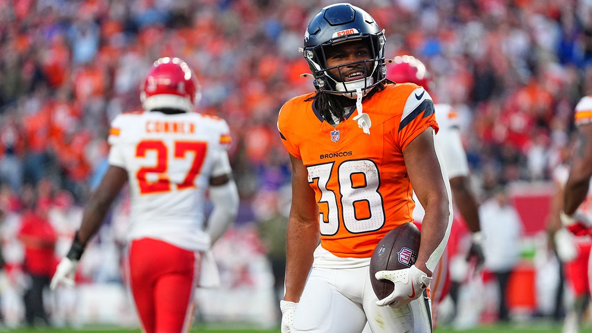Jaleel McLaughlin celebrates after a score