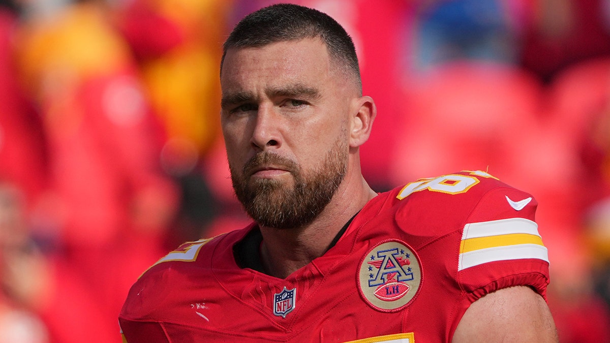 Travis Kelce looks on