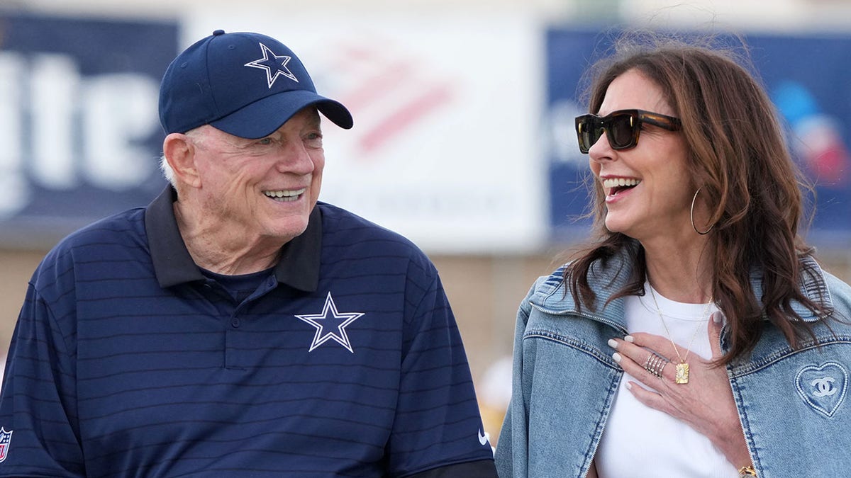 Jerry Jones and Charlotte Jones share the stage